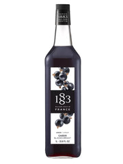 1883 Solbærsirup – aromatisk frugtsirup med dyb solbærsmag, perfekt til cocktails, mocktails og desserter.