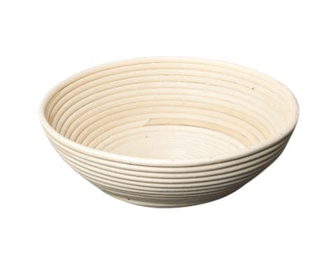 Raskekurv / hævekurv i robust flettet materiale – ideel til hævning af brøddej i professionelle bagerier og køkkener.