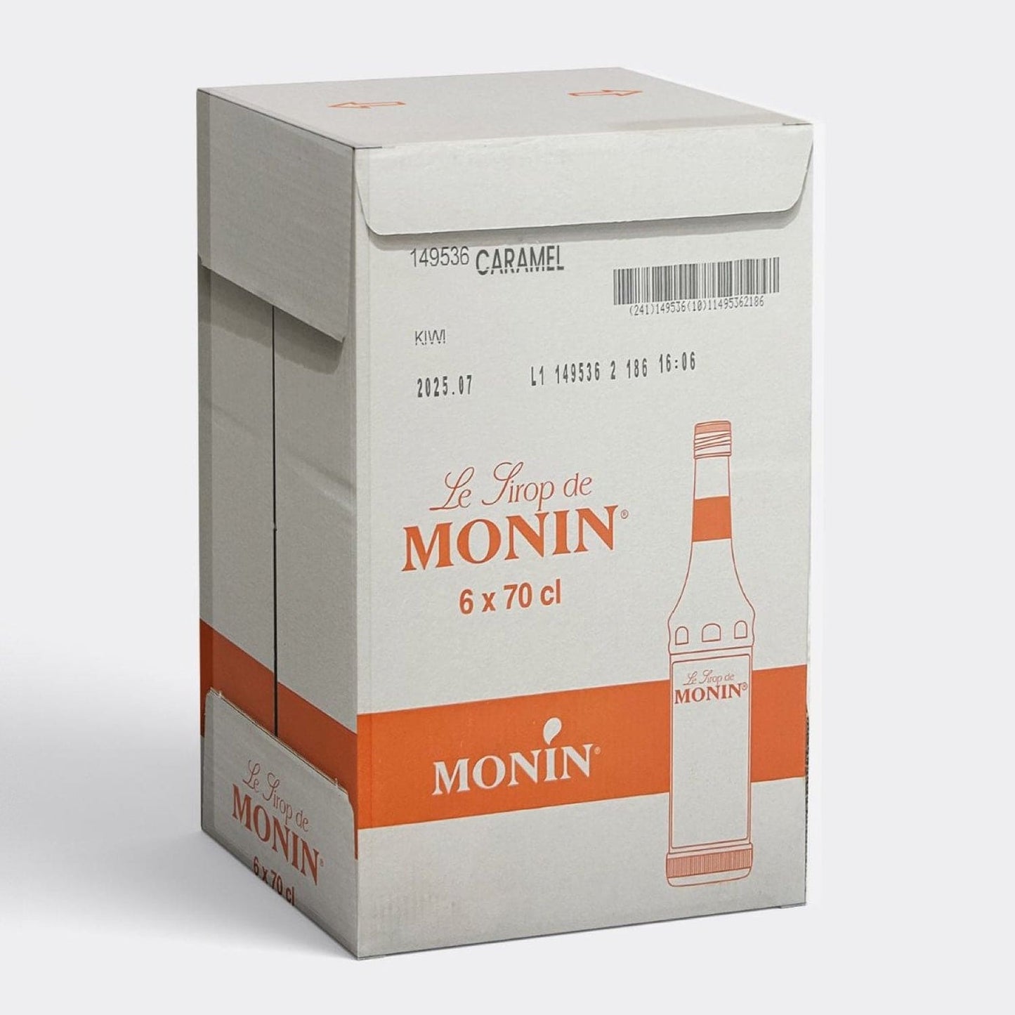Monin Caramel Sirup flaske i kasse, sød karamelsirup til kaffedrikke og cocktails
