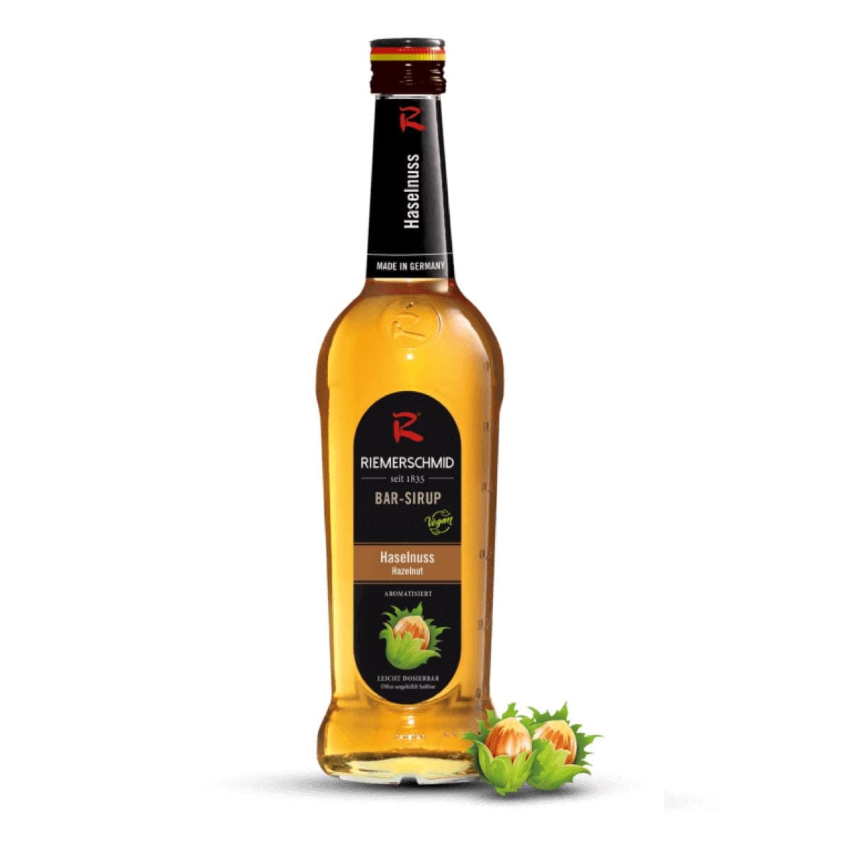 Riemerschmid Hasselnøddesirup – delikat sirup med rund smag af ristede hasselnødder, perfekt til kaffe, desserter og varme drikke.