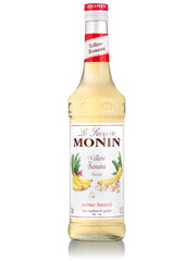 Tilføj en eksotisk og frisk bananaroma til dine favoritdrinks med Monin Gul Banan Sirup.